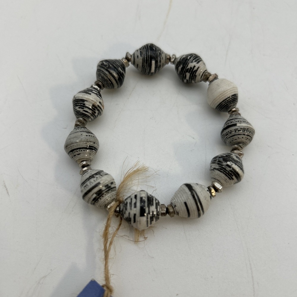 handmade bracelet from Just One Africa features striking black-and-white